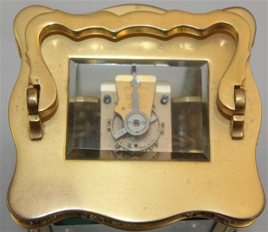 An early 20th century French gilt brass carriage alarm clock, 5.25in.